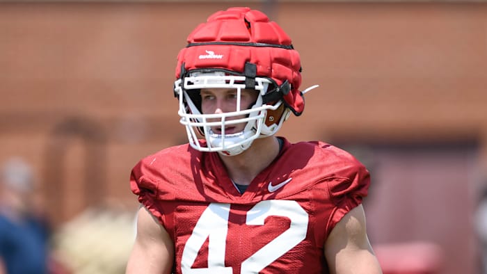 Alabama Crimson Tide transfer Drew Sanders listens to defensive coaches in practice while gearing up for the Razorbacks' season opener against Cincinnati in Fayetteville.